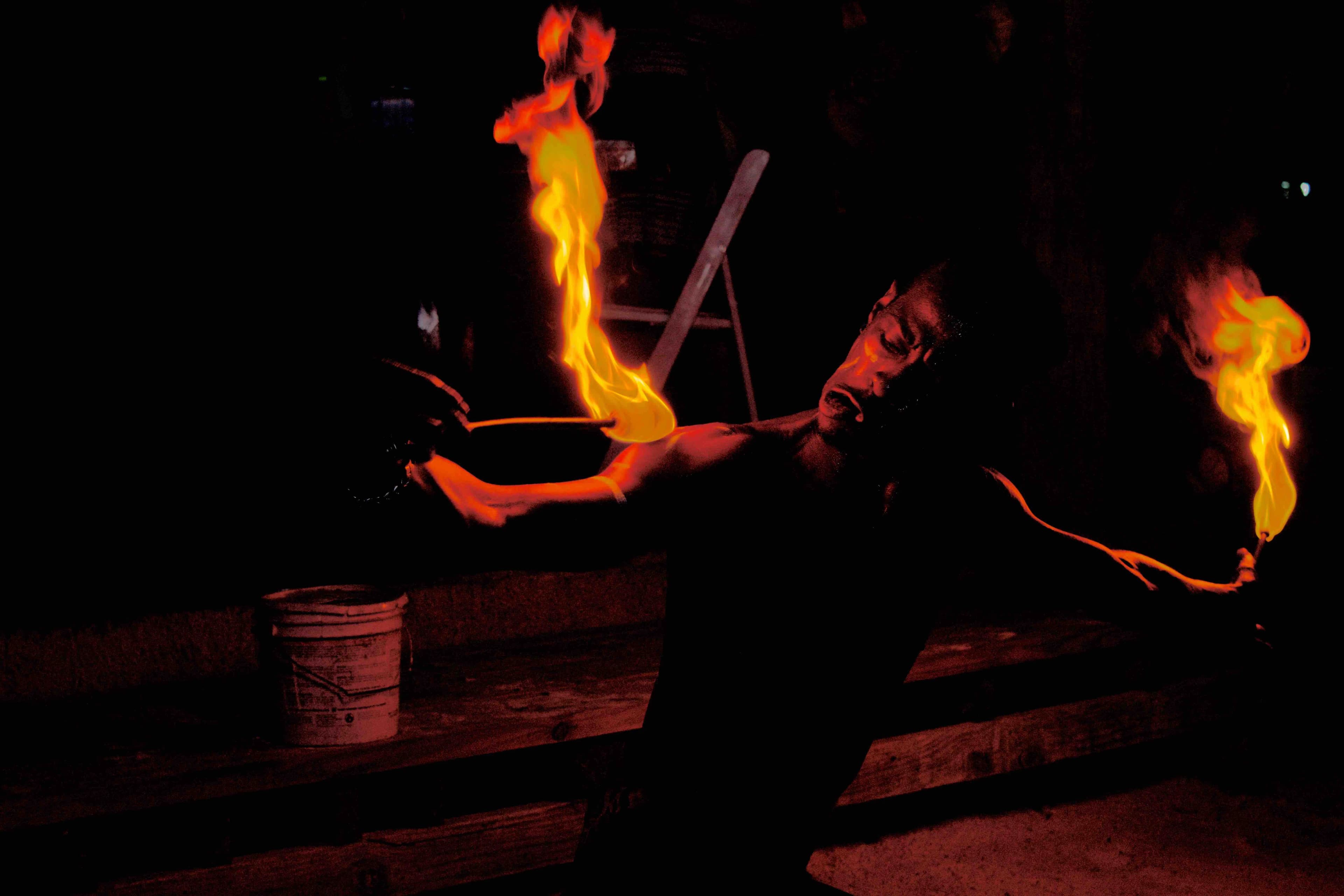 A fire dancer mid-performance