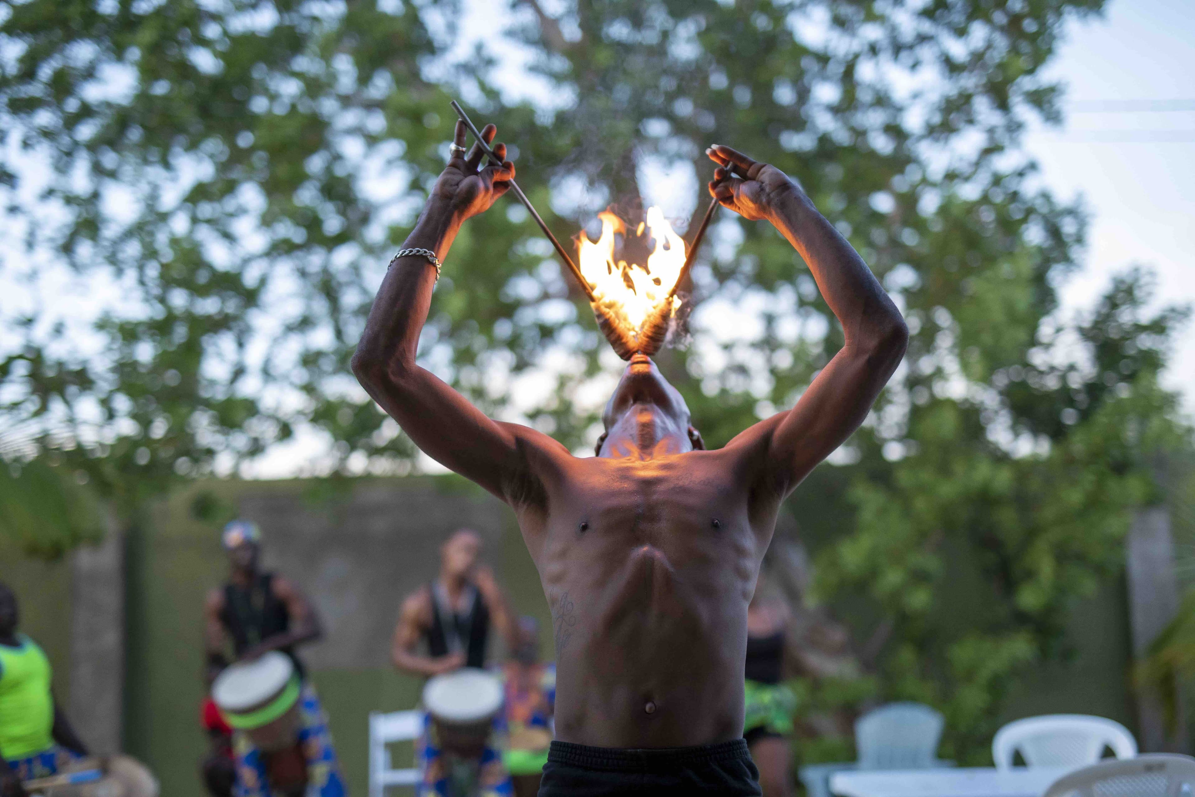 A fire dancer performing at the lagoon